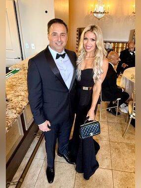 Nicole Bakti Black Strapless Peplum Mermaid Gown